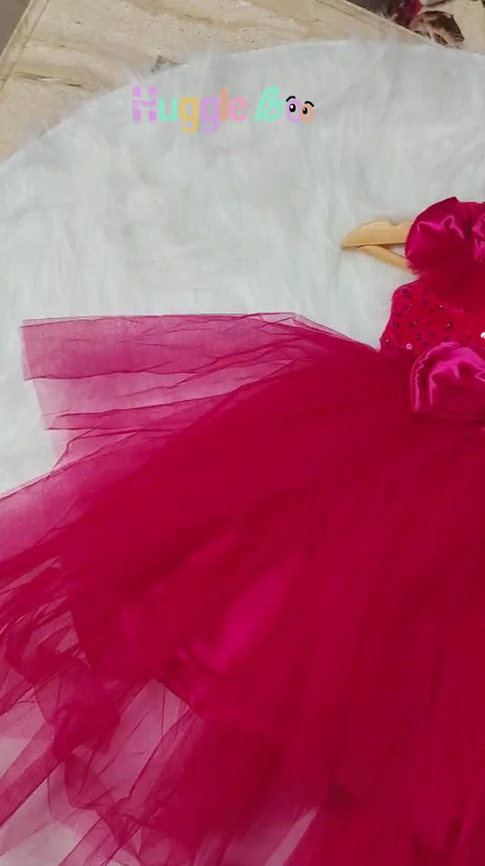 Magenta high-low gown for girls from HuggleBoo — soft, breathable, and twirl-friendly kids’ party dress designed for comfort and movement. Perfect for birthdays, festive events, and photoshoots with elegant flair and zero stiffness.